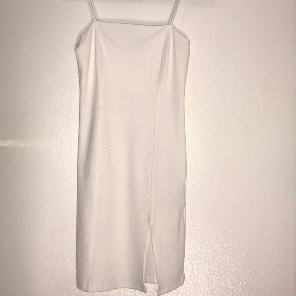 Never worn form fitting super cute white dress!
